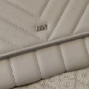 Elegant Beige DKNT Quilted Handbag